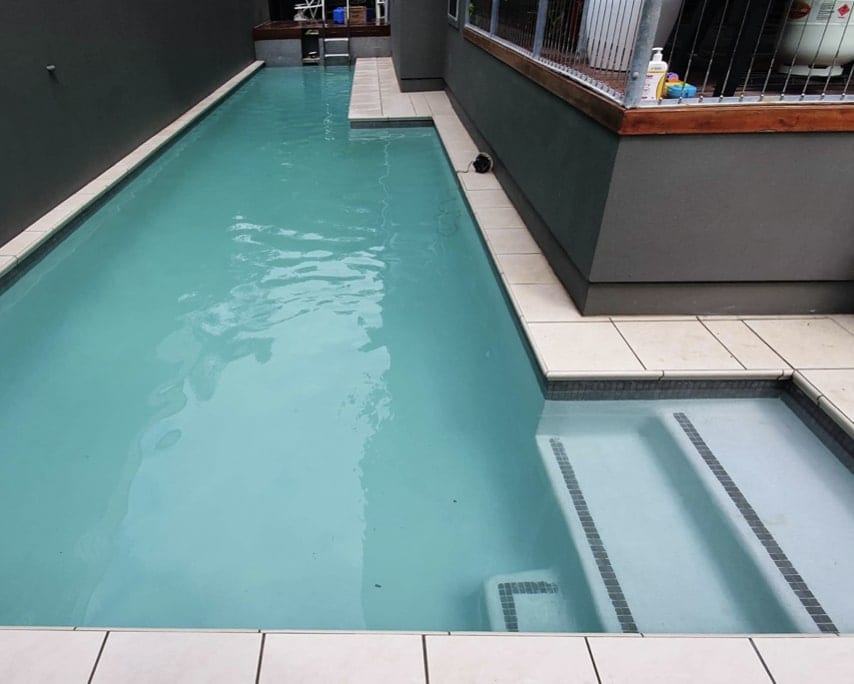 Modern Pool After Concrete Pool Renovations - Luxury Pools